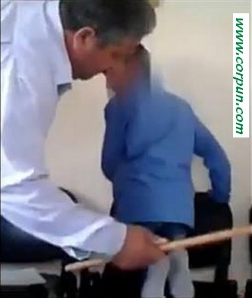 School principal canes student on the soles of the feet